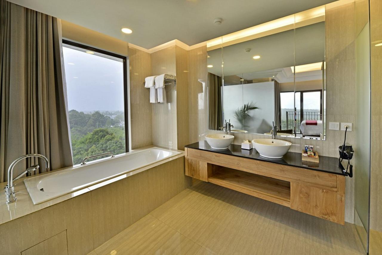 Famvida Hotel Lubuklinggau الغرفة الصورة
